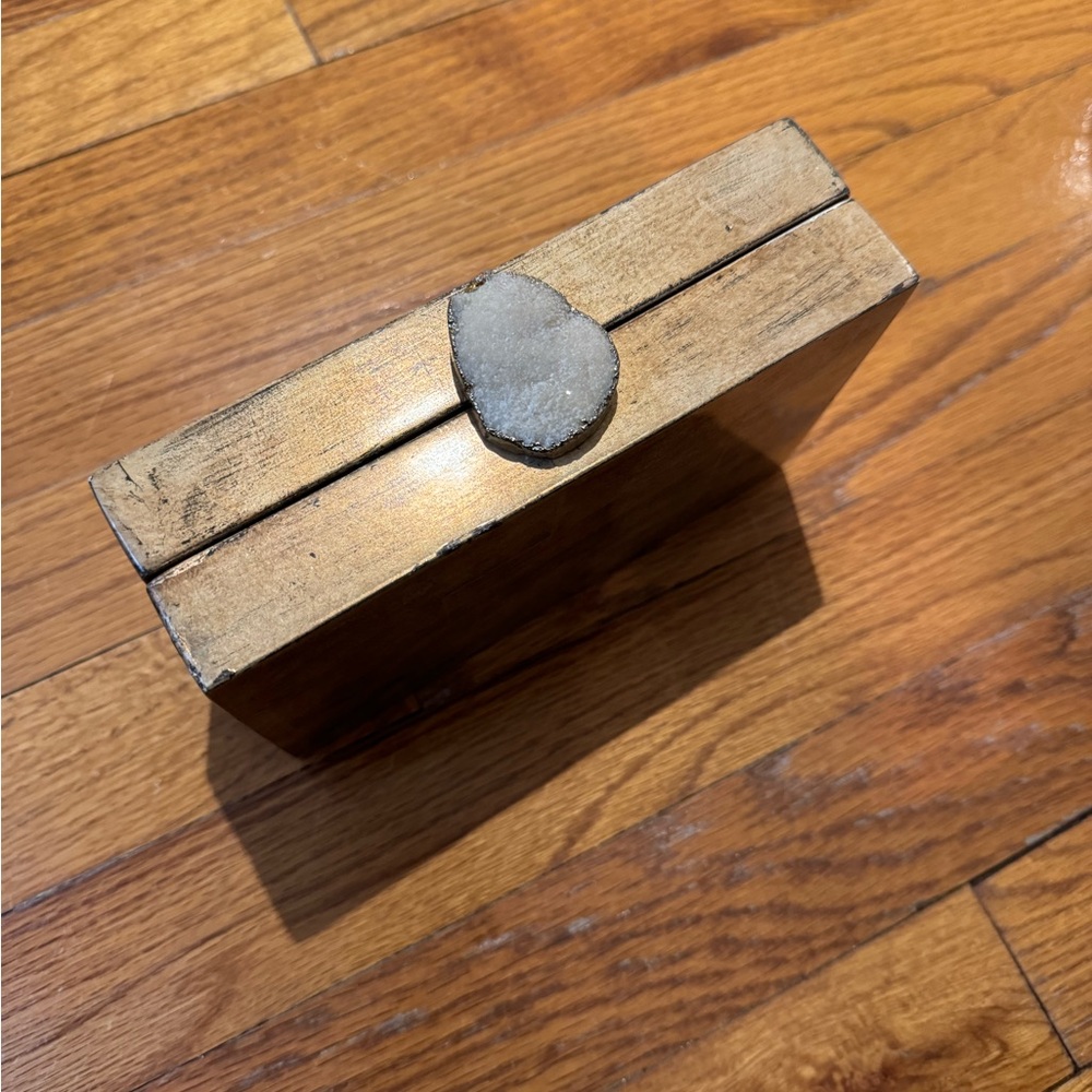 Women’s square clutch with stone jewel closure